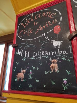 Artistic boards on wall for menu at Cafe Arriba in Isle Of Skye