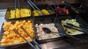 lo0ts of fruits to add to the desert at Xiao in Bornheim