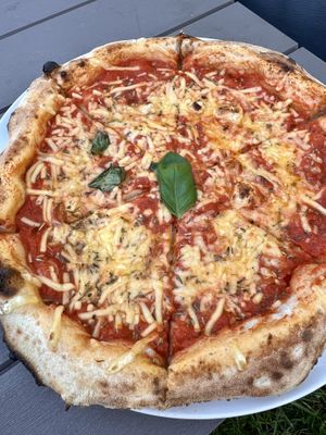 Vegan cheese and tomato pizza   at Full Moon in Sigulda