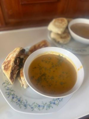 Soup from sweet potatoes and red lentils and filled flatbread with beetroot and mushrooms on the side  at Eco Sailors in Lipari