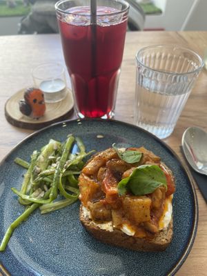 Bruschetta appetizer with Hibuscus infusion drink  at Le Rouge-gorge Restaurant in Menton