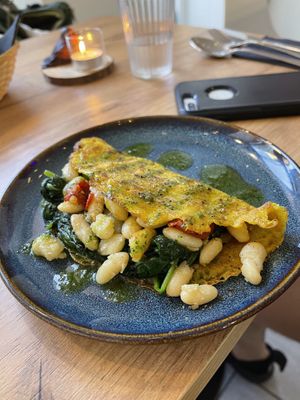 Chickpea based crepe appetizer with spinach and beans. My favorite thing I tried there!  at Le Rouge-gorge Restaurant in Menton