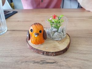 Decoration fitting the restaurants name at Le Rouge-gorge Restaurant in Menton