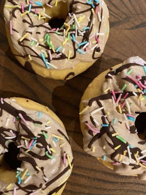 DONUTS! Chocolate cream frosting, with dark chocolate and very vegan sprinkles!   at Nomi the Karakal in Malmo