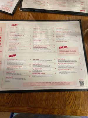 Main menu vegan on bottom (photo of the whole thing to show the ratio) snacks on the other side with vegan drumstick, mac and cheese bites, cauliflower, cheesy garlic bread   at Cornish Arms in Brunswick