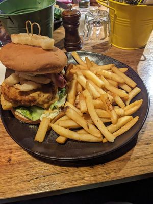 Loaded Vegan Chicken Kiev Burger with chips at Cornish Arms in Brunswick