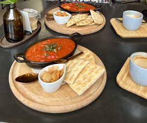 Shakshuka with pita bread and Kimchi  at Minimum Waste in Prague