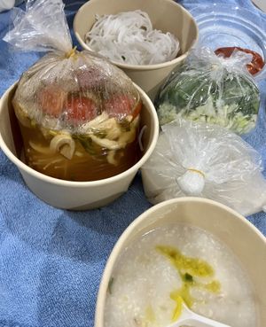 Grab order: veg sausage, congee, and sour soup  at Nhà Hàng Chay Link Vegan in Da Lat