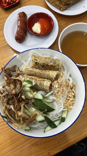 Sausage (so tasty!) and Bún Chả Giò (noodles with spring rolls and fresh veg/herbs)  at Nhà Hàng Chay Link Vegan in Da Lat