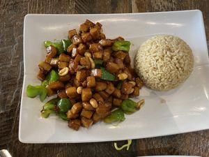 Kung pow chicken with brown rice  at Vegan District Asian Eatery in Anaheim