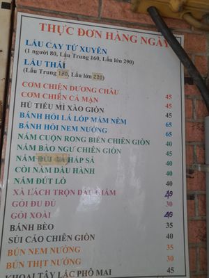 Menu on wall. In Vietnamese only at Dì Sáu in Ho Chi Minh City