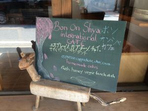 Board at Bon On Shya International Cafe in Koya