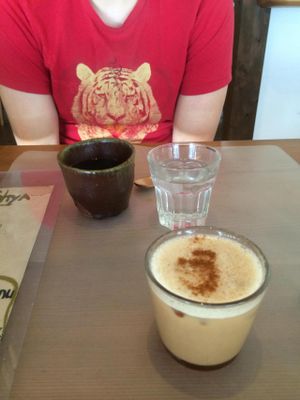 Coffee and iced chai with soy milk at Bon On Shya International Cafe in Koya
