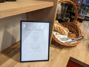 Hot drinks menu and vegan baguette at La Cime Deli in Edinburgh