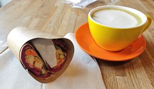 Soy chicken wrap with blueberry matcha latte at Caffeine - Aspazijas in Riga