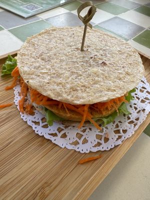 Arepa burger   at Clover Coffee + MarketPlace in Oranjestad