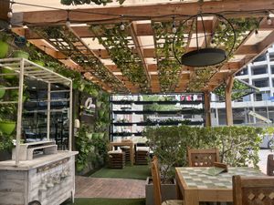 Cozy lovely outdoor seating  at Clover Coffee + MarketPlace in Oranjestad