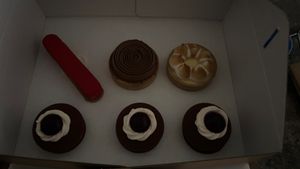 3 Black Forest, raspberry, lemon meringue and caramel and chocolate mousse tart   at GingerSnap Patisserie in West Melbourne