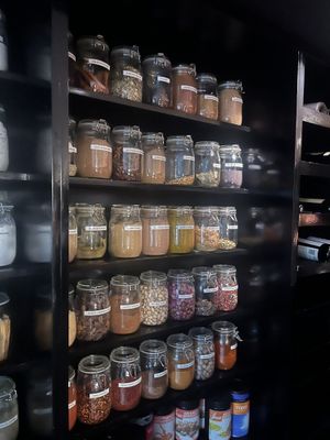 Wide array of spices, legumes and vegan powders used in the cooking   at Infini in Noord