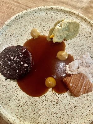 Appetizer with roasted beet and vegan jus  at Infini in Noord