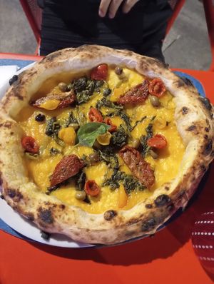 With pumpkin sauce at Uagliò in Parma