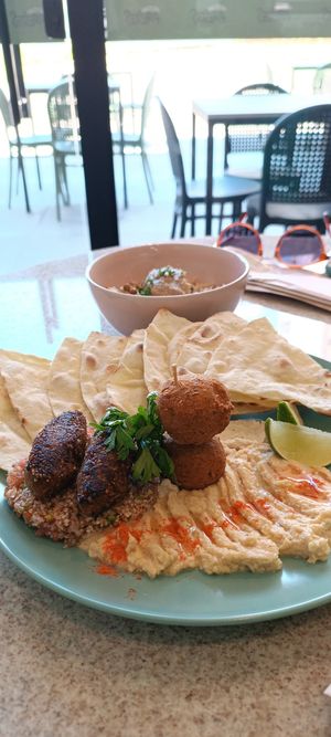 Habib (House-made falafel, mushroom kafta, dry chestnut curd, hummus, tabbouleh, babaganoush, rice with lentils and sheet bread) at Kantina Prestes in Natal