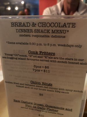 Try the conch fritters  at Bread and Chocolate Vegan Bistro in George Town