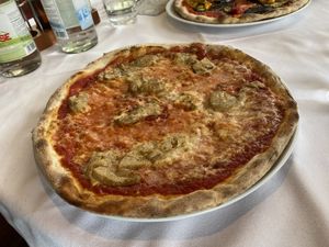 Margherita con porcini  at Hotel Dolomiten Ristorante Pizzeria in Dobbiaco