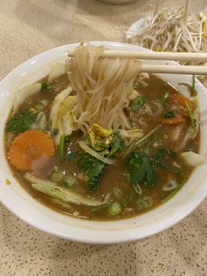 Peanut beef sate pho (removed beef and added veggies)   at Pho Hoan Pasteur in Calgary