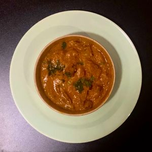The Jaipur curry on a side plate (in it's original container) to give a true representation of portion size at Chatori Vegan Indian  in London
