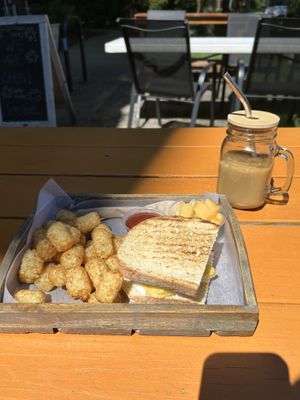 Vegan breakfast sandwich with vegan egg, sausage and cream cheese    at October Cafe in Chicago