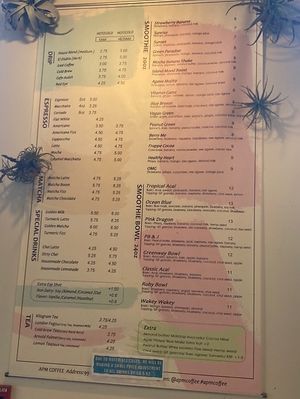 Wall menu for smoothies and ☕️   at APM Coffee in Boston