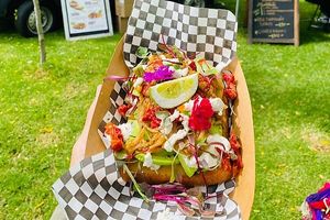 Vegan Streetfood Truck – Avocado on Toast (Caramelised onions, sun-dried tomatoes, cashew sour cream, lemon and edible flowers)  at Vegan Streetfood ZA - Food Truck in Cape Town