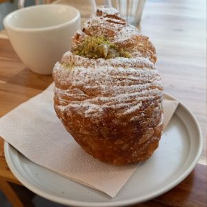 pistachio cruffin 90czk ≈ 3,60€ at Version Coffee in Prague