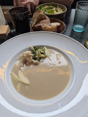starter: cauliflower velouté with pickled cauliflower, sour apple & green oil at Planttrekkerij  in Antwerpen