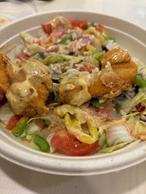 Crispy chicken bowl (rice instead of fries).   at Vegholic in Toronto