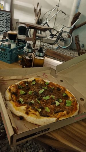 Microdosis pizza. at Nomada   in Santa Marta