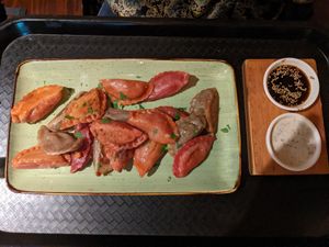 Large with Hot Potato, Spicy Seitan & Champ Lover dumplings and Creamy-Mint & Soy-Sesame dips (12,90€) - 4/5 at Momos - Organic Veggie Dumplings in Berlin