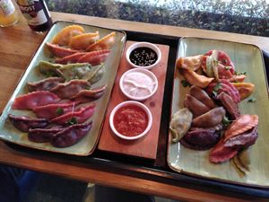 Steamed (left) and fried (right), all six vegan flavors at Momos - Organic Veggie Dumplings in Berlin