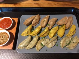 Spinach/cheese, pumpkin/chickpea and broccoli/shiitake/tofu dumplings  at Momos - Organic Veggie Dumplings in Berlin