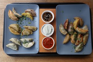 Sample platter of all six stuffings, all three dips, half steamed, half fried. at Momos - Organic Veggie Dumplings in Berlin