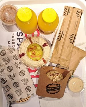 Orange juice, hummus and stuffed falafel at AUH - Operation Falafel - TA in Abu Dhabi