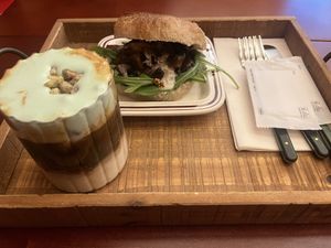 Mushroom ciabatta sandwich and pistachio cold-foam latte (house specialty coffee drink)  at Ashville Bakery Cafe - 애쉬빌 베이커리 카페 in Seoul