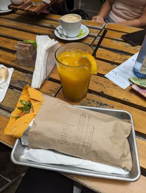 Wrap vegano con jugo de naranja at UBU Café in Buenos Aires