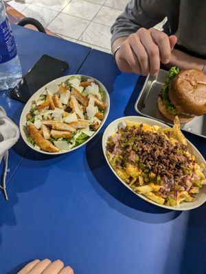 Burger, ceasar salad, loaded fries at Eden Jaxx - Illum in Copenhagen