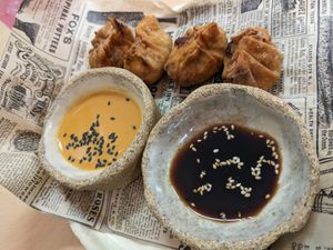 Fried gyoza with miso peanut sauce at La Galla Tasca Vegana in Barcelona