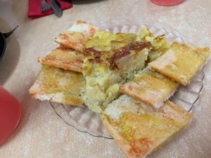 Spanish tortilla with calcots at La Galla Tasca Vegana in Barcelona