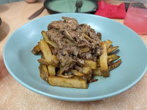 Fricase and home fries at La Galla Tasca Vegana in Barcelona