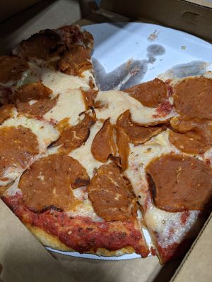 NY style pepperoni and artichoke pizza at Kitchen 17 in Chicago