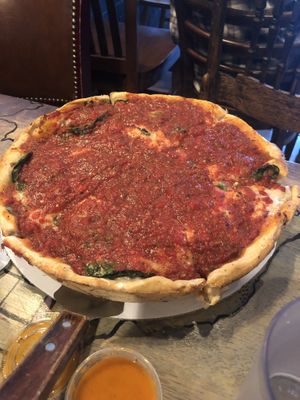 Traditional deep dish with spinach at Kitchen 17 in Chicago